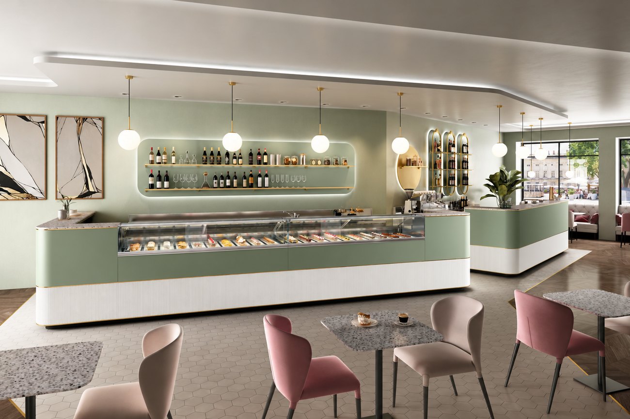 Eisdiele mit hellem Verkaufstresen in Salbeigrün, Eisvitrine und Sitzbereich mit rosa Stühlen